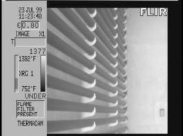 Thermal image shows normal thermal pattern. Image taken through opaque flame.